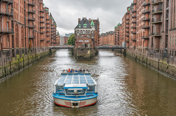 Fototapeta na wymiar Hamburg, Germany - built between 1883 and 1927, the Hamburg Speicherstadt is the largest warehouse district in the world, and a Unesco World Heritage site