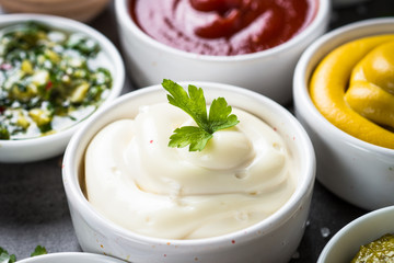 Sauce set assortment - mayonnaise, mustard, ketchup and others.