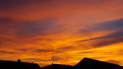 Fototapeta na wymiar Sonnenuntergang über Dächern