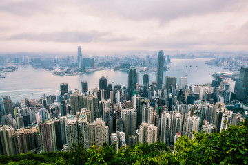 Modern City and Business with foggy weather from Victoria Peak, Hong Kong.