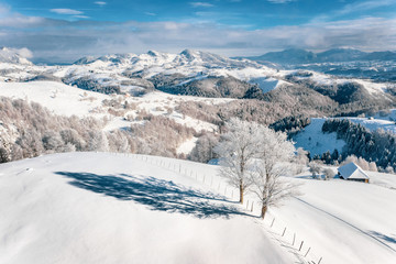 Fototapeta na wymiar Christmas in Transylvania with the traditional snow covered landscape of this time of the year