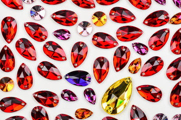 Colorful jewellery stone for sewing. Drop form.