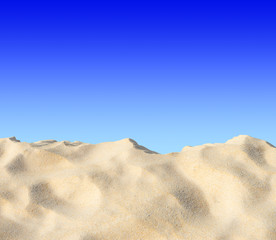 Fototapeta na wymiar Sand on blue sky background.