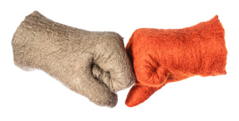 fist bump of orange and green gloves isolated