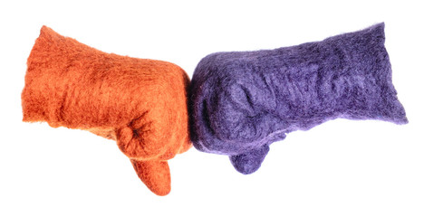 fist bump of orange and purple gloves isolated