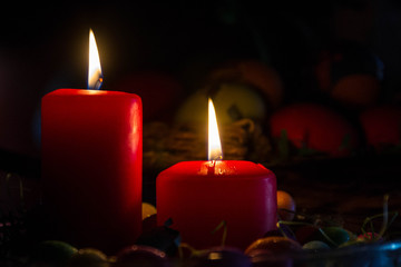It's a holiday. Red candles on a dark background, an inevitable detail when the holidays are on.