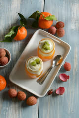 delicious dessert with lychees mousse and tangerine cream