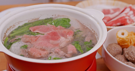 Family having hot pot at home