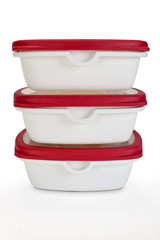 three piles tupperwares on an isolated background