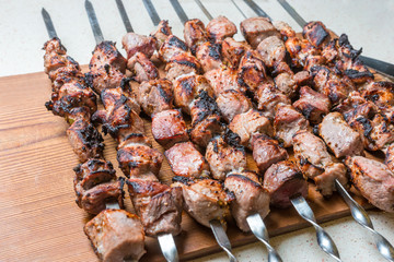 Juicy slices of meat  prepared on coals