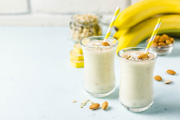 Vanilla cinnamon almond smoothie with coconut flakes. Selective focus, space for text.