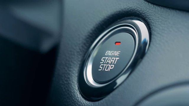 Ignition of car engine by pushing a button