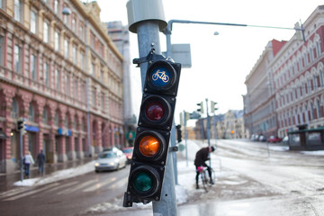 HELSINKI, FINLAND - MARCH 20, 2011: Traffic light with a signal for the bike. Ecological transport...