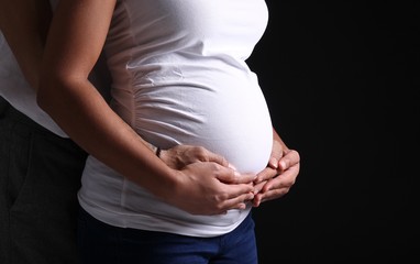 Portrait of a beautiful happy commercial pregnant woman