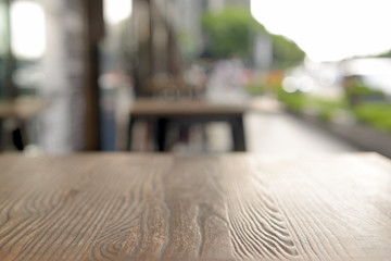close-up table and cafe in the background