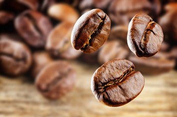 Coffee beans on a dark wood background