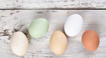 Easter Eggs: Five Different Eggs on rustic wood table