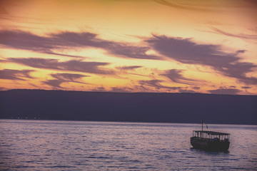 Fototapeta na wymiar Dawn over the Sea of Galilee. Beautiful Sea of Galilee in the morning. Time before sunrise