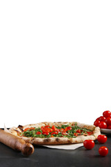 vegetarian pizza with cherry and arugula on table with isolated white background