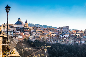 Obraz premium View of Ariccia, with the monumental bridge and the church of Santa Maria Assunta by Gian Lorenzo Bernini. Castelli Romani, Lazio, Italy.