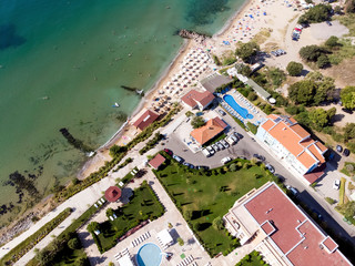 Fototapeta na wymiar aerial shooting of the resort in Sveti Vlas, sea view and hotel residential buildings with swimming pools on the territory