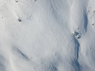 Aerial view of snow covered mountain with impressive structure © Mario