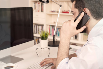 businessman working at office desk