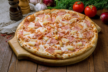 pizza Hawaiian with pineapple and ham