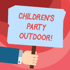 Word writing text Children S Is Party Outdoor. Business concept for Kids festivity held outside the house Hu analysis Hand Holding Blank Colored Placard with Stick photo Text Space