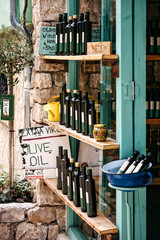Olive oil bottles on street market in old town 
