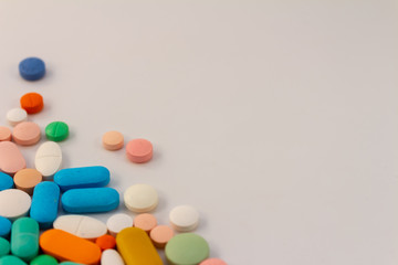 Pills of various colors. Medications for oral use.