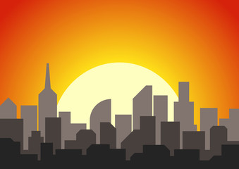 City skyline with skyscrapers and varied buildings silhouettes with gigantic yellow sun in the background and colorful golden, orange and red sky