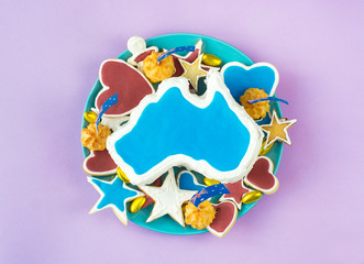 vanilla cream cake in a shape of the Australia - Happy Australia Day message greeting card 