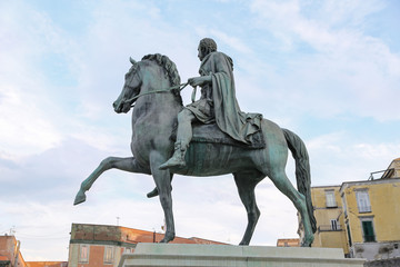Fototapeta na wymiar Statue in Piazza del Plebiscito, Naples, Italy