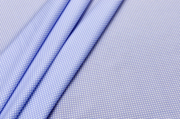 Cotton fabric, white and blue geometric pattern on dark blue