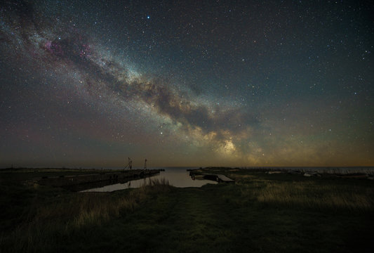 The Milky Way over the harbour in Sk&auml;rl&ouml;v