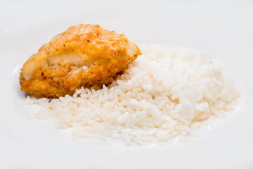 breaded chicken fillet with a side dish of rice
