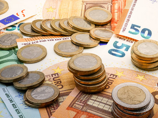 Image of Euro money in coins and bills close up