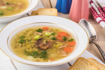 Homemade pea soup with smoked bacon.