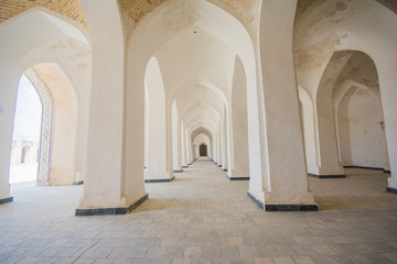 Fototapeta na wymiar White Corridor of Po-i-Kalyan mosque complex in Bukhara, Uzbekistan