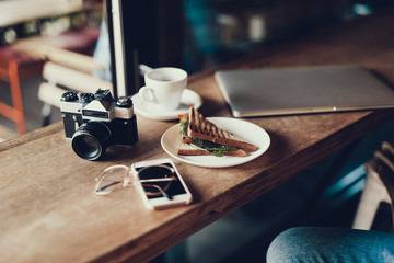 Obraz na płótnie Canvas Group of technology object and snack lying on table