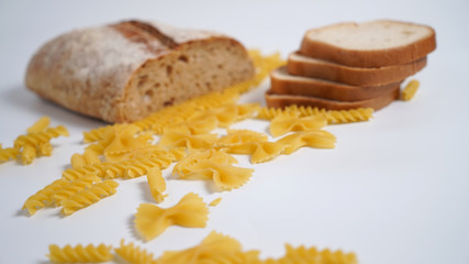 Fototapeta na wymiar Pasta and bread. Products from wheat flour with gluten. 