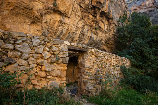 sheepfold with a stone wall to keep in livestock in the Barranco de la Hoz Seca canyon next to Jaraba town, province of Zaragoza, Aragon, Spain  
