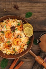 Shrimp (Prawn ) Biryani top down view on wooden background