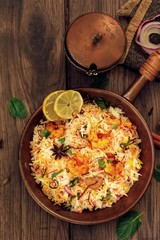 Shrimp (Prawn ) Biryani top down view on wooden background