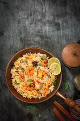 Shrimp (Prawn ) Biryani top down view on wooden background