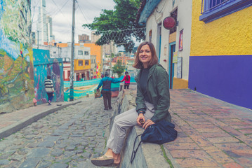 happy tourist girl visiting the city center of Bogotá, Colombia