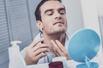 Confident young man preparing for working day