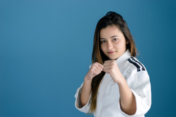 Girl in Karate Taekwondo Fighting Stance