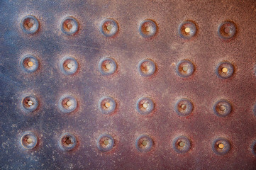 Background of metal with holes.